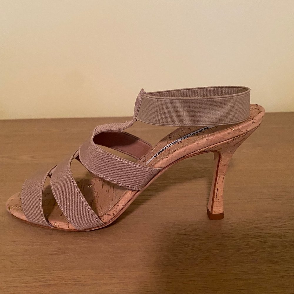 Manolo Blahnik sandals. 3.5" heel. Tan elastic straps and cork heel.  Size 7.5.